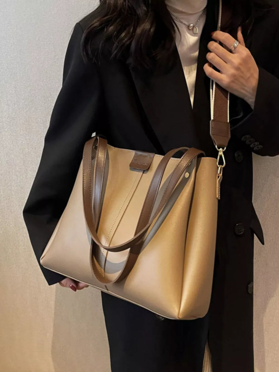 Elegant wide strap pu leather trapezoid bag in khaki with brown straps and detachable strap.