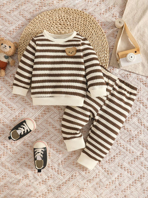 pajama set in ivory with striped and chenille patch