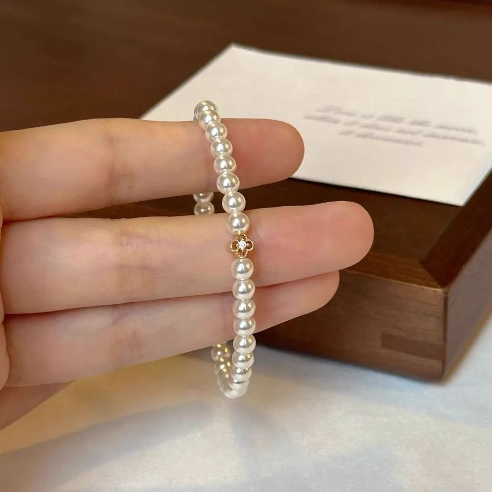 bracelet in ivory featuring pearl beads and fitted fit
