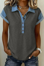 Colorblocked polo t-shirt with denim collar and sleeves, button placket, and cuffed short sleeves.