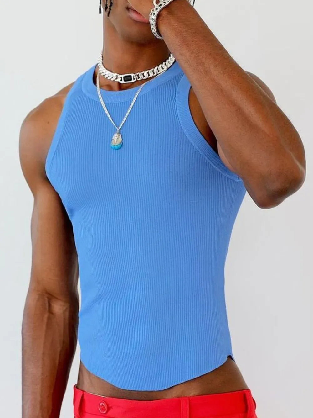 Blue ribbed tank top with asymmetric hem and crew neck