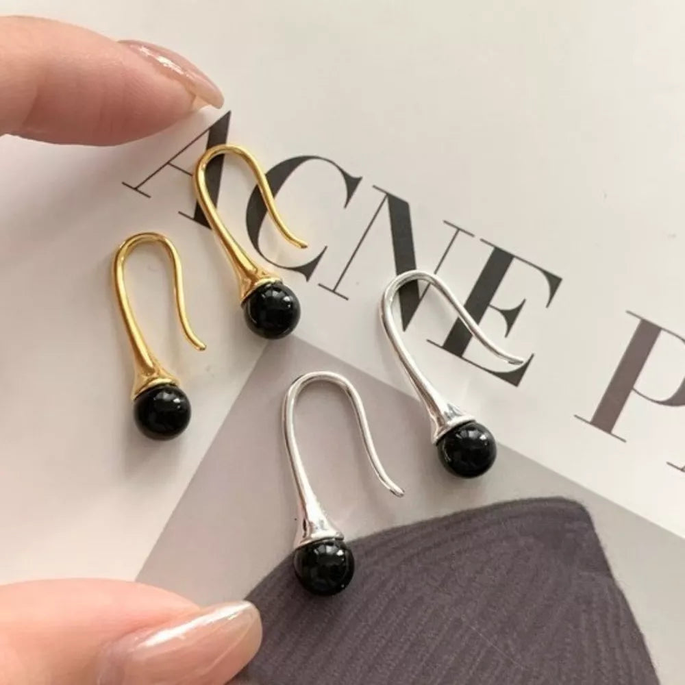 Platinum-Plated,18K Gold-Plated,925 sterling silver Care instructions: Avoid wea earrings in silver with teardrop silhouette