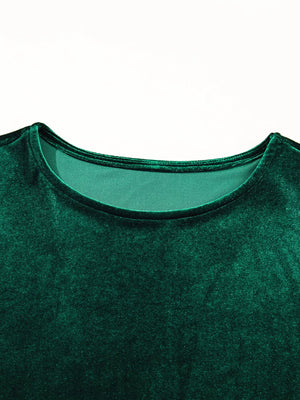 Dark green velvet mini dress with round neckline and short puff sleeves.