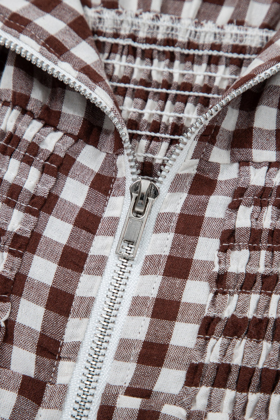 Gingham zip-front midi dress in taupe cotton with smocked bodice detail.