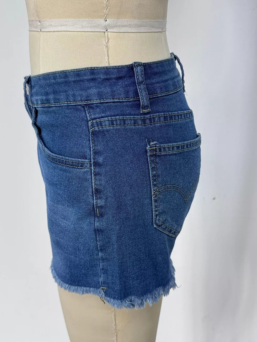 Classic blue denim shorts with frayed hem and button fly.