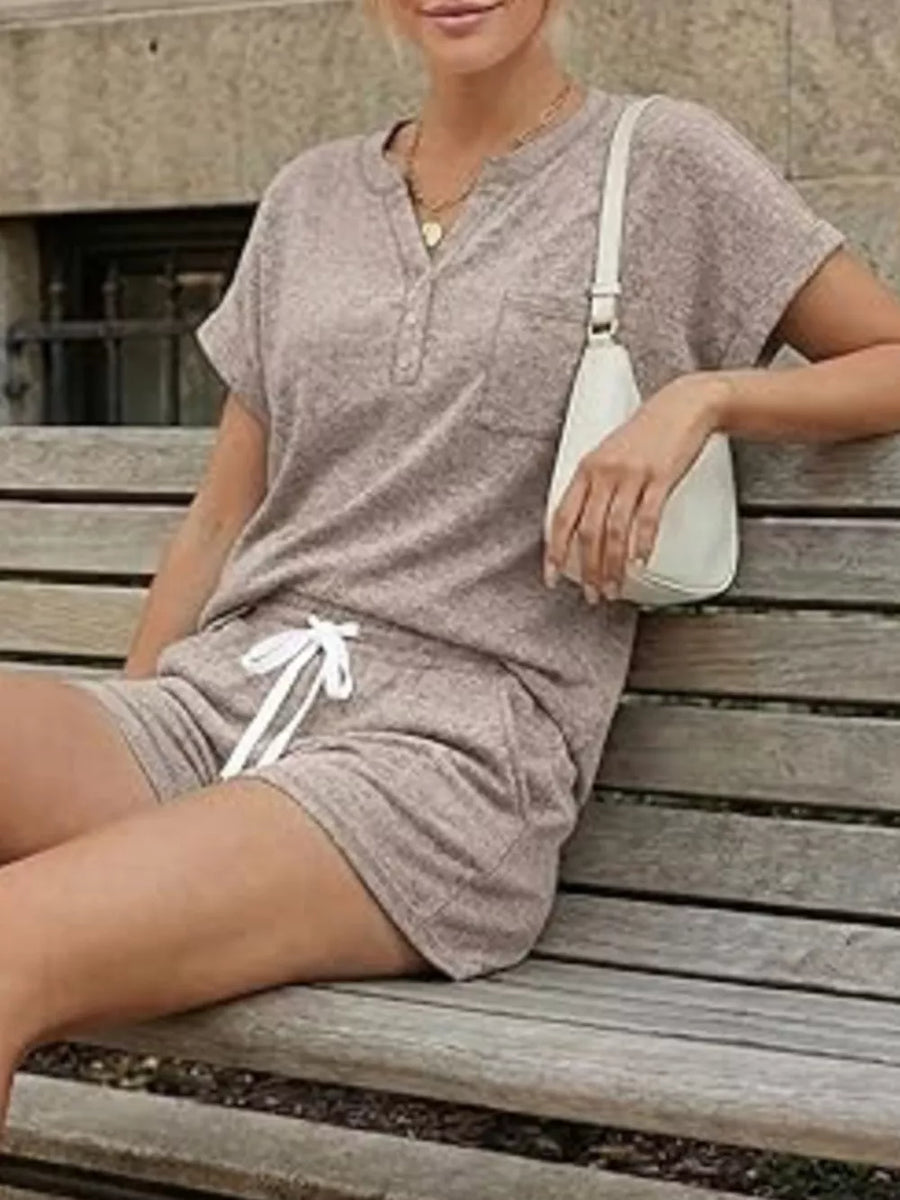 Relaxed two-piece set in Khaki Color with pocketed henley top and drawstring shorts.