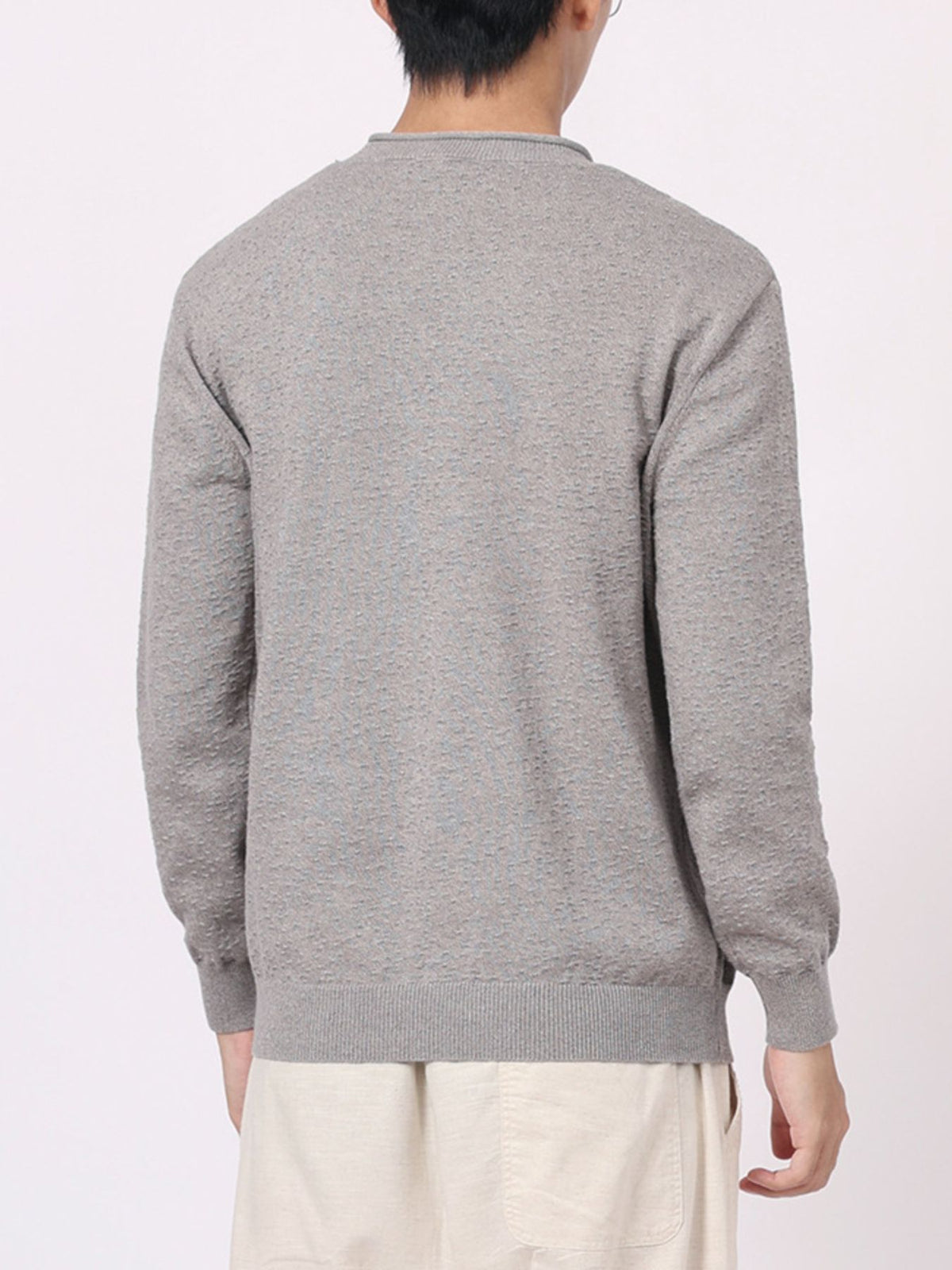 Terracotta crewneck sweater featuring lightweight and textured