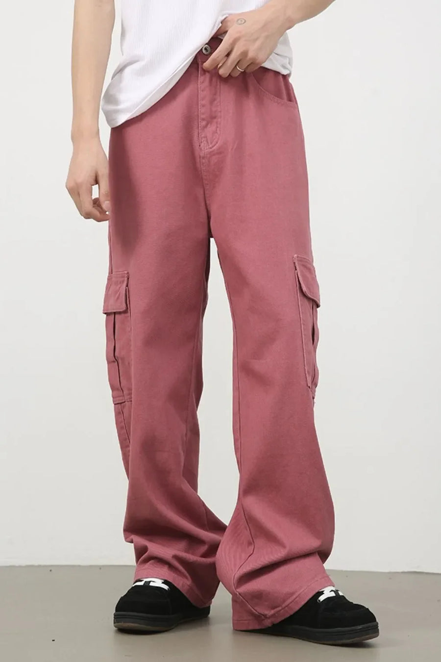 Dusty Rose wide-leg cargo pants with multiple pockets and a casual fit.