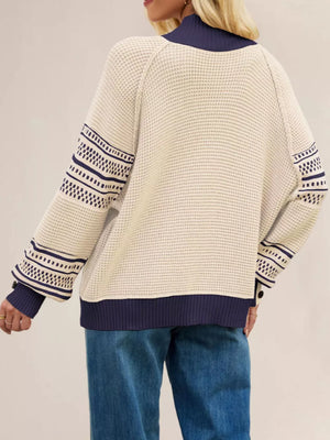 navy blue mock neck sweater featuring ribbed and color-block