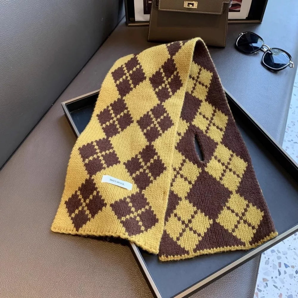 Cozy argyle pattern wool scarf in brown and yellow with a small slit detail.