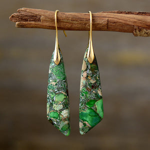 Green and gold dangle earrings with marbled stone pattern