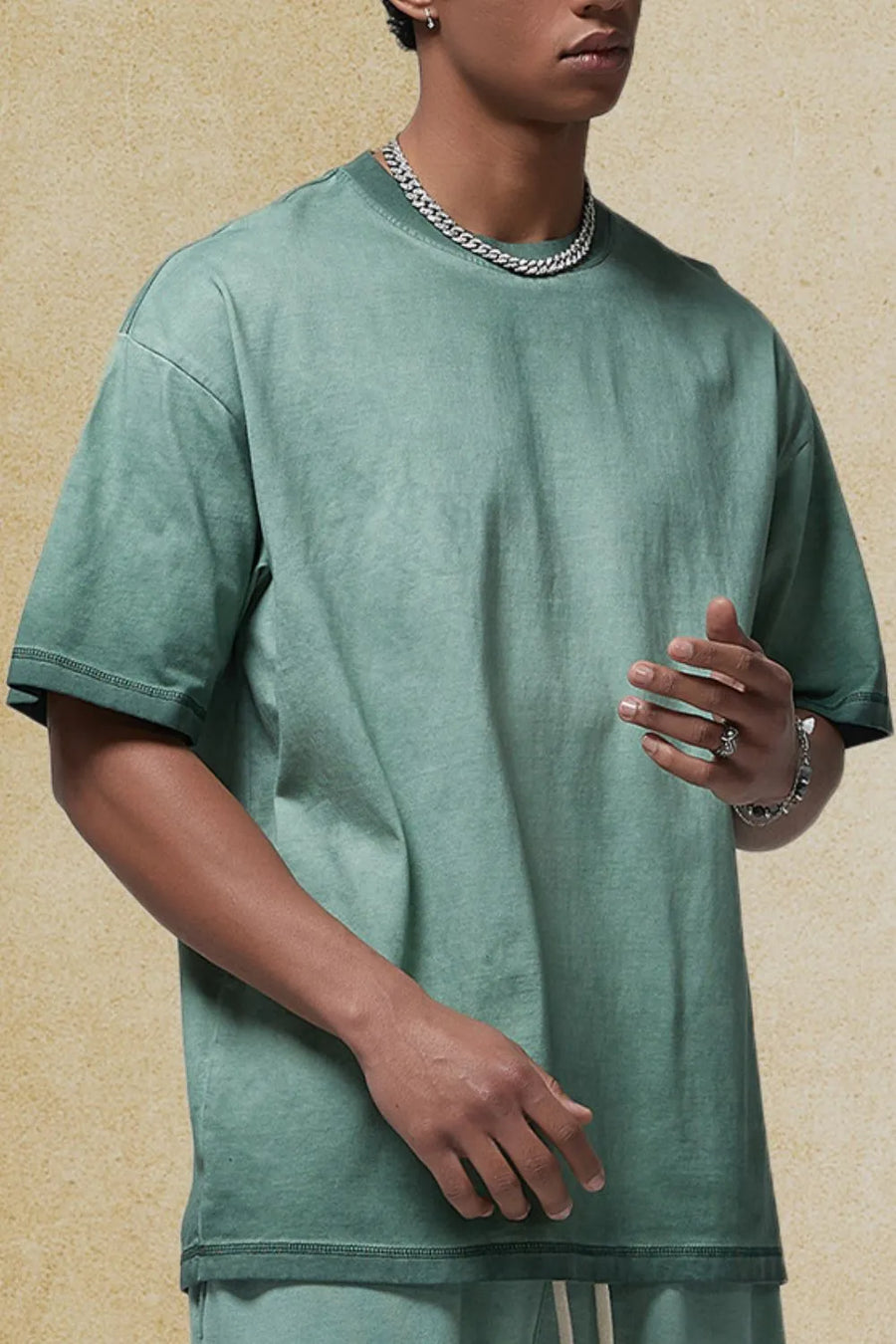 Pigment-dyed oversized tee in Moss, featuring a crew neck and short sleeves.