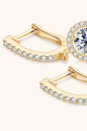 Gold pavé halo drop earrings with clear cubic zirconia stones.