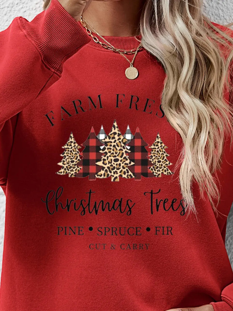 Red Christmas graphic crewneck sweatshirt with leopard and buffalo plaid trees.