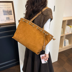 Drawstring Suede Shoulder Bag in Brown with drawstring closure