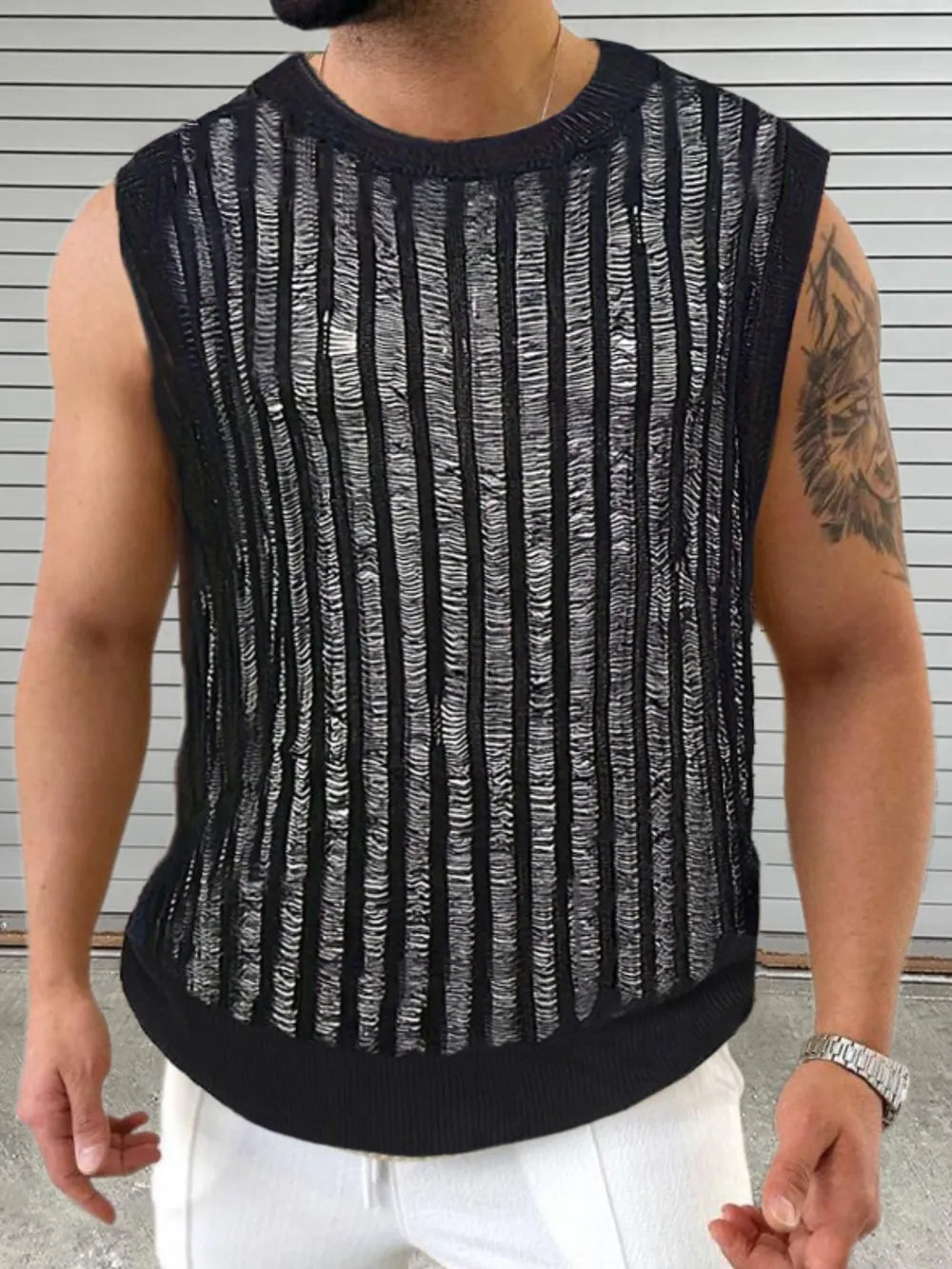 Black textured stripe knit tank top with a crew neck and sleeveless design.