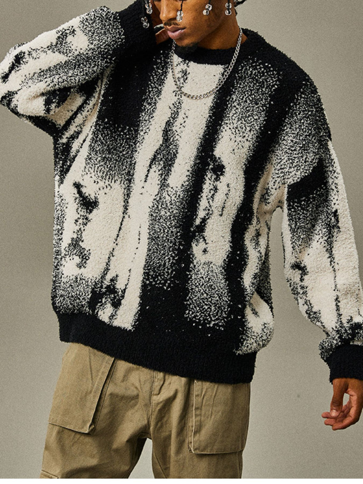 black pullover sweater with tie-dye and crew neck