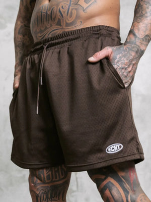 Men's dark brown perforated performance drawstring shorts with pockets and logo detail.