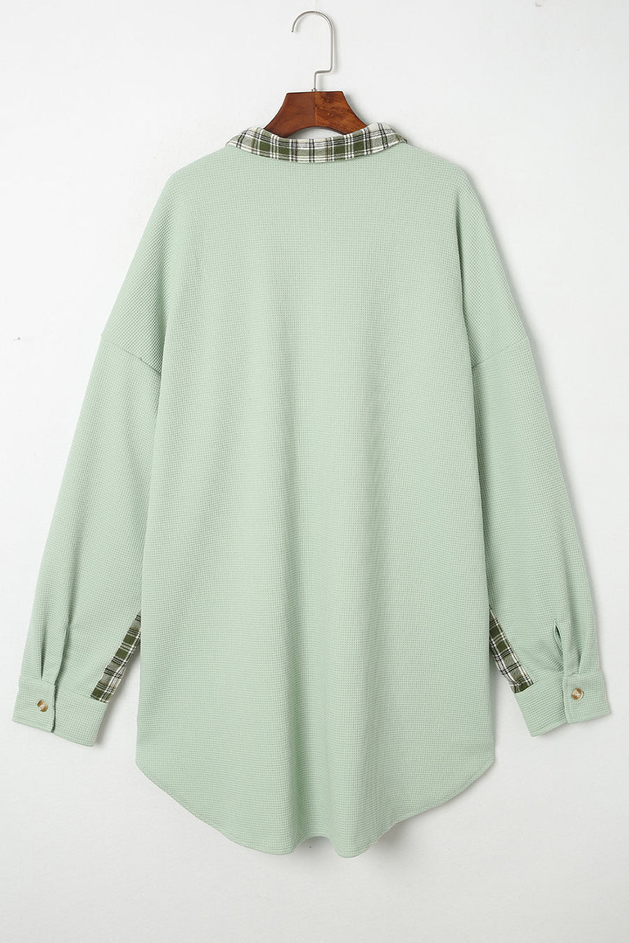 Light green waffle knit overshirt with plaid collar and cuffs, button front.