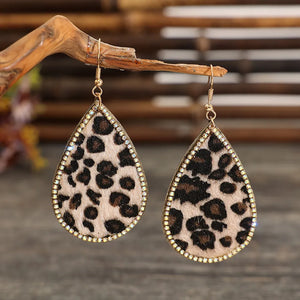 Leopard print crystal drop earrings with gold hooks and a teardrop shape.