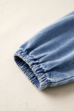 Puff Sleeve V Neck Ruffled Denim Mini Dress in medium wash denim blue with tied