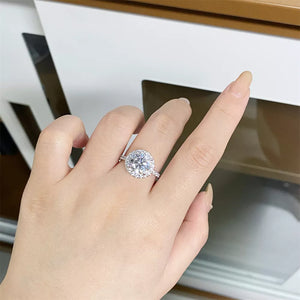 925 sterling silver,Moissanite Carat weight: 5CT Care instructions: Avoid wearin ring in clear with round silhouette