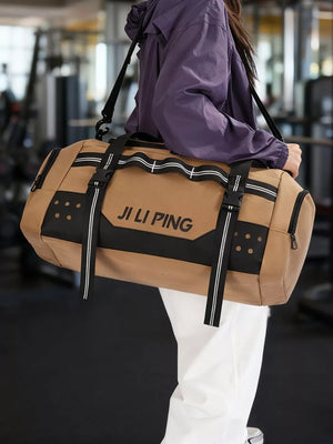 Caramel Oxford cloth travel tote bag with black accents and compression straps