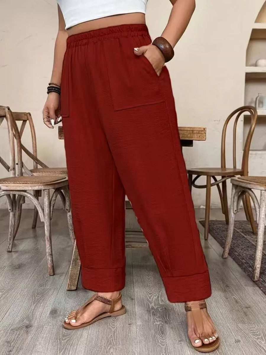 100% polyester Care instructions: Machine wash cold wide-leg pants in White with loose silhouette