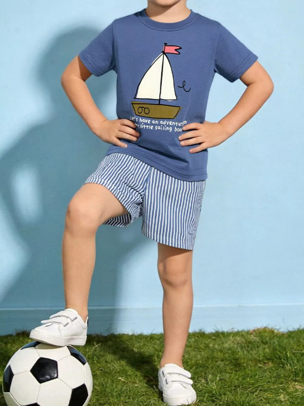 Toddler blue cotton t-shirt with sailboat graphic and striped shorts set