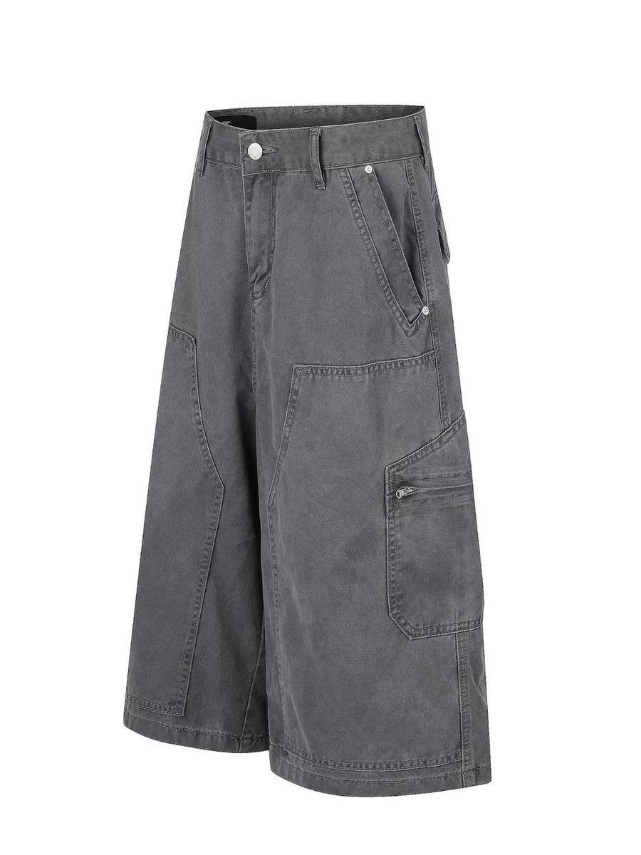 Men's relaxed fit grey cotton cargo capris with multiple pockets and a zippered pocket detail.