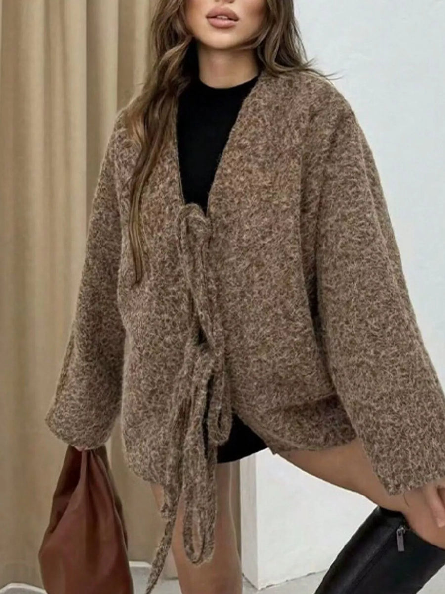 Textured knit tie-front cardigan in dark brown with long sleeves and an open front.