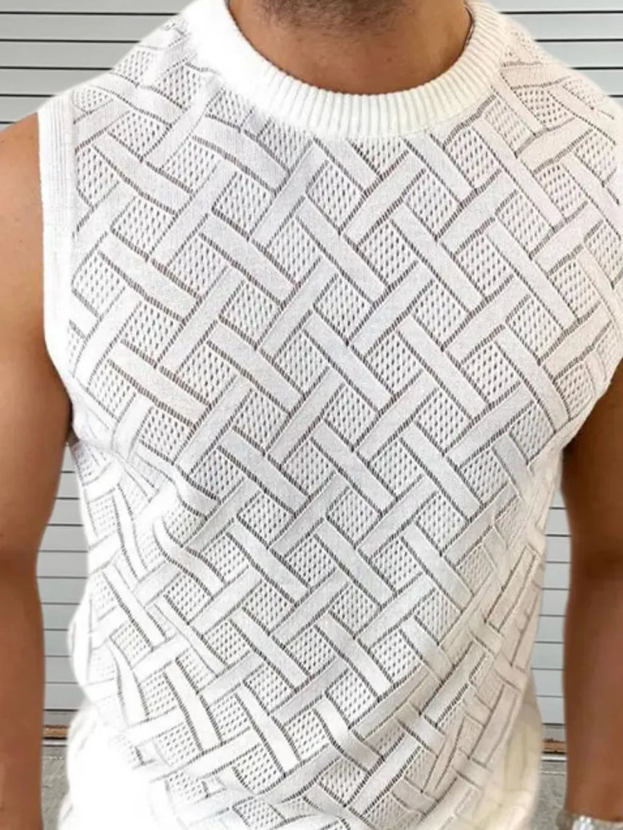 White knit sleeveless sweater with a geometric pattern and crew neck.