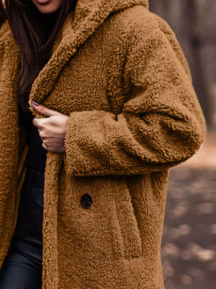 Brown teddy bear longline coat with hood and button closure.