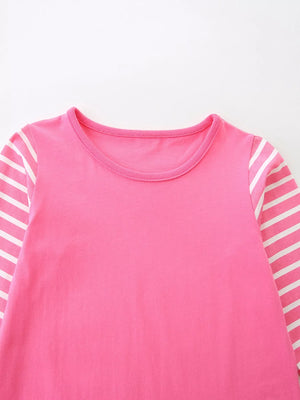 Pink cotton baby dress with striped long sleeves and round neckline.