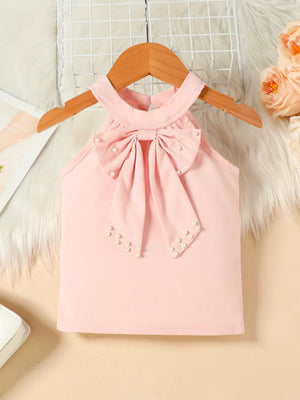 Pink toddler halter top with pearl bowknot detail
