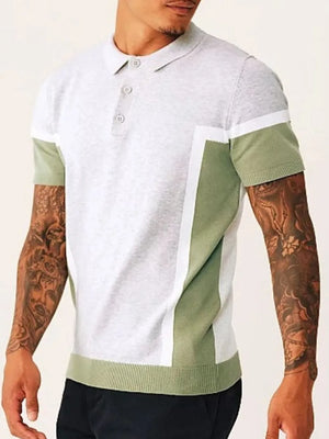 Geometric panel knit polo shirt in light grey and matcha green with short sleeves and buttoned collar.