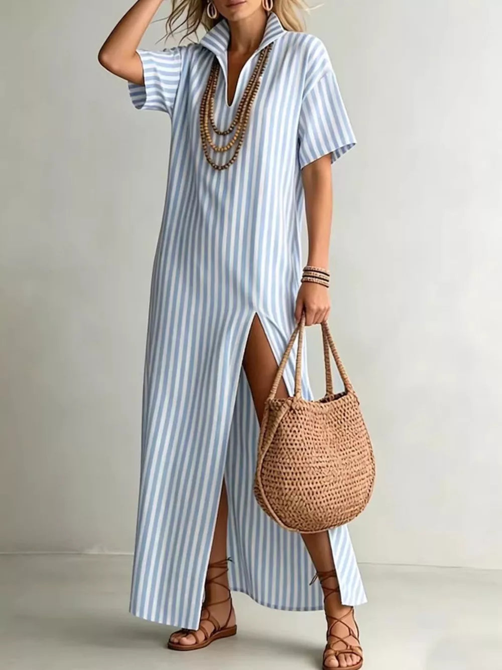 Sky blue striped maxi shirt dress with high slit and v-neck.