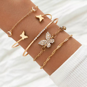 gold bracelet with butterfly and n/a