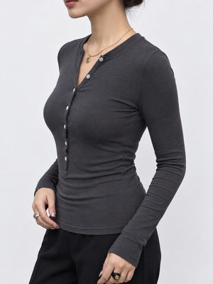 Contains 65% lyocell and less than 30% wool henley in Dark Gray with slim silhouette