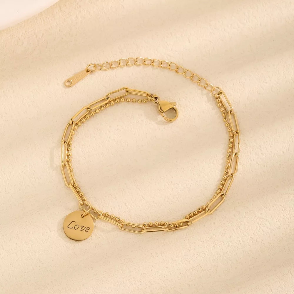 18K Gold-Plated,Titanium Steel Care instructions: Avoid wearing during exercise, bracelet in Gold with regular silhouette