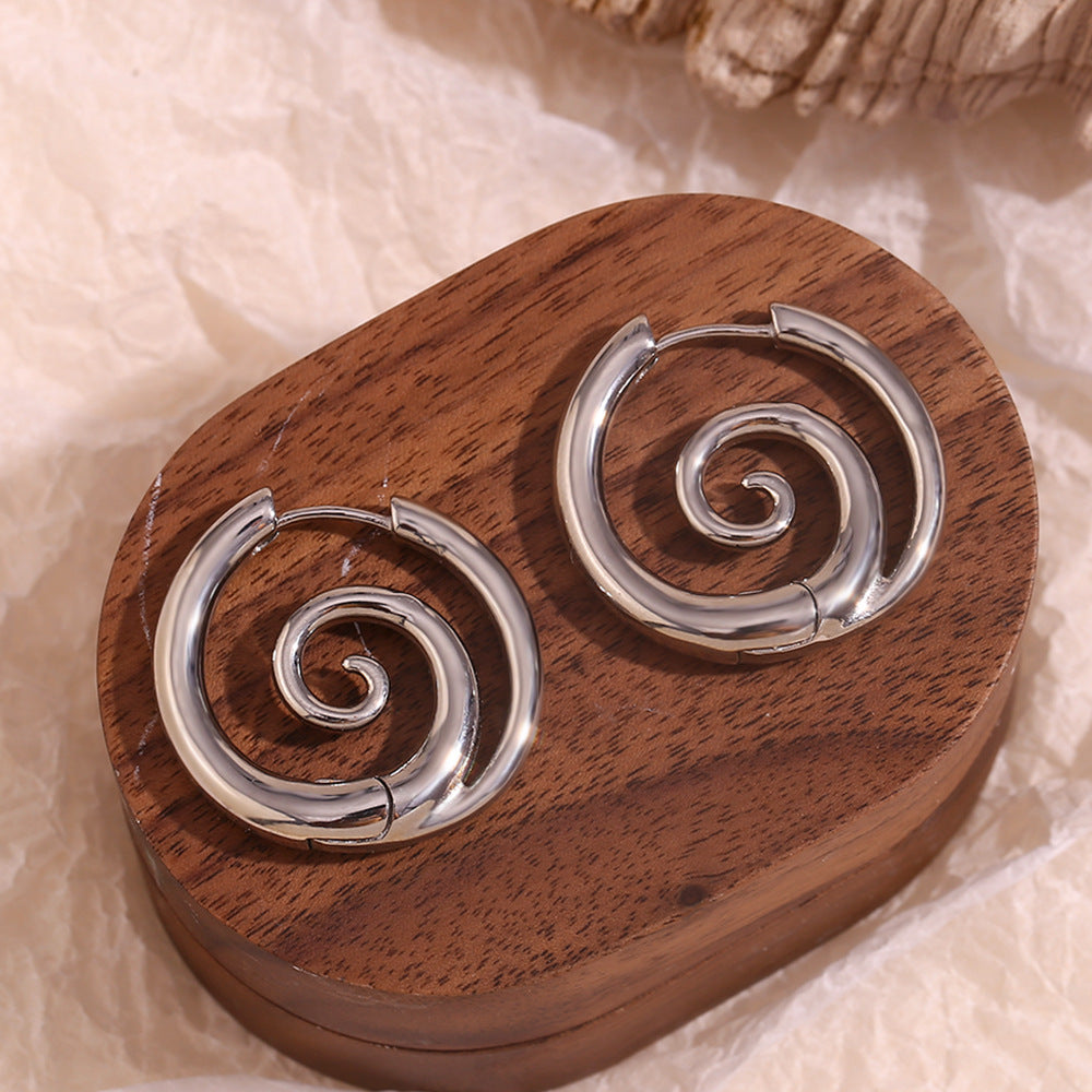 gold with earrings with spiral design