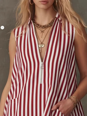 Red and white striped mini dress with zipper front and pockets.