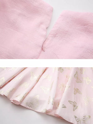 Pink midi dress with gold butterfly print and cinched waist detail