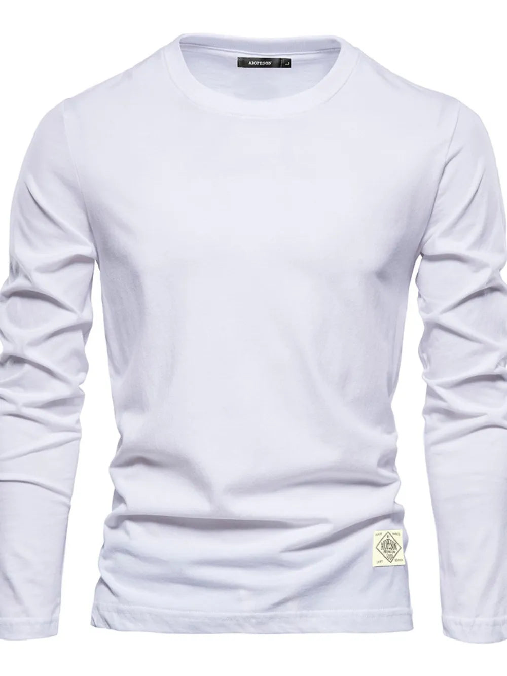 White long sleeve crew-neck tee with textured fabric and a decorative patch detail.