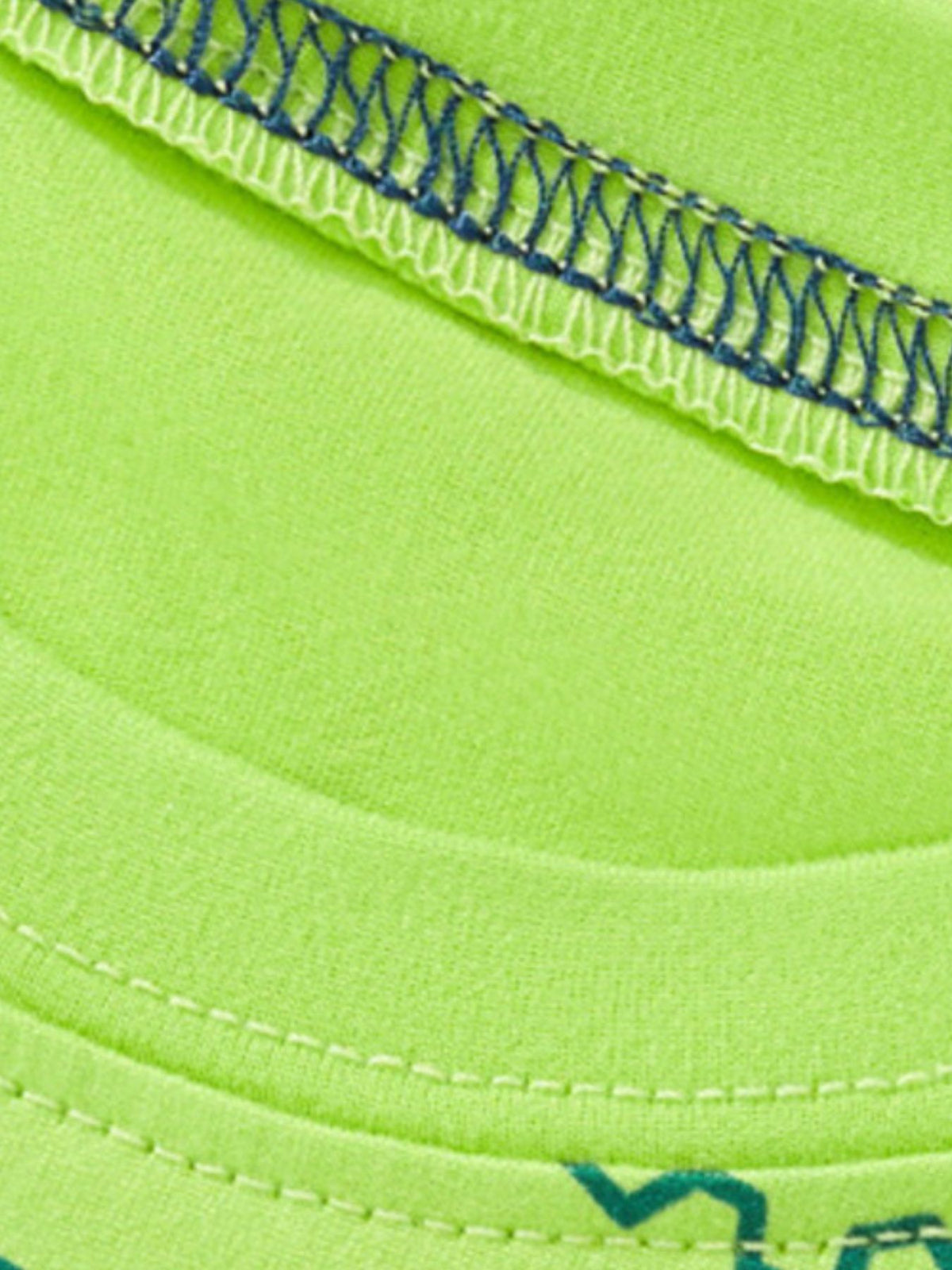 Lime green toddler t-shirt with construction vehicle outline pattern and contrast stitching.