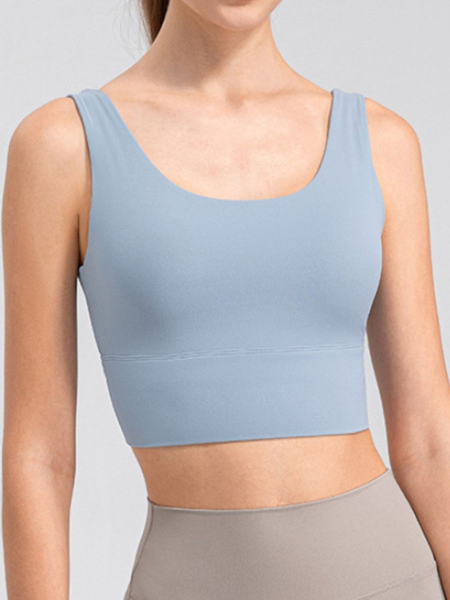 Light blue performance crop top with scoop neck and wide band
