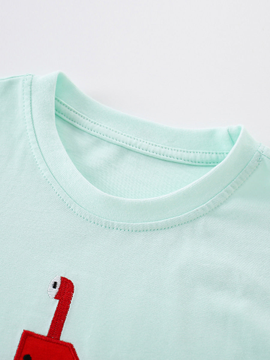 Light blue cotton crew neck t-shirt with red embroidered submarine detail.