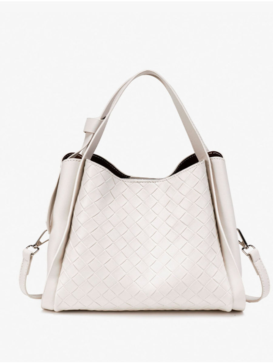 crossbody bag in cream with woven and adjustable strap