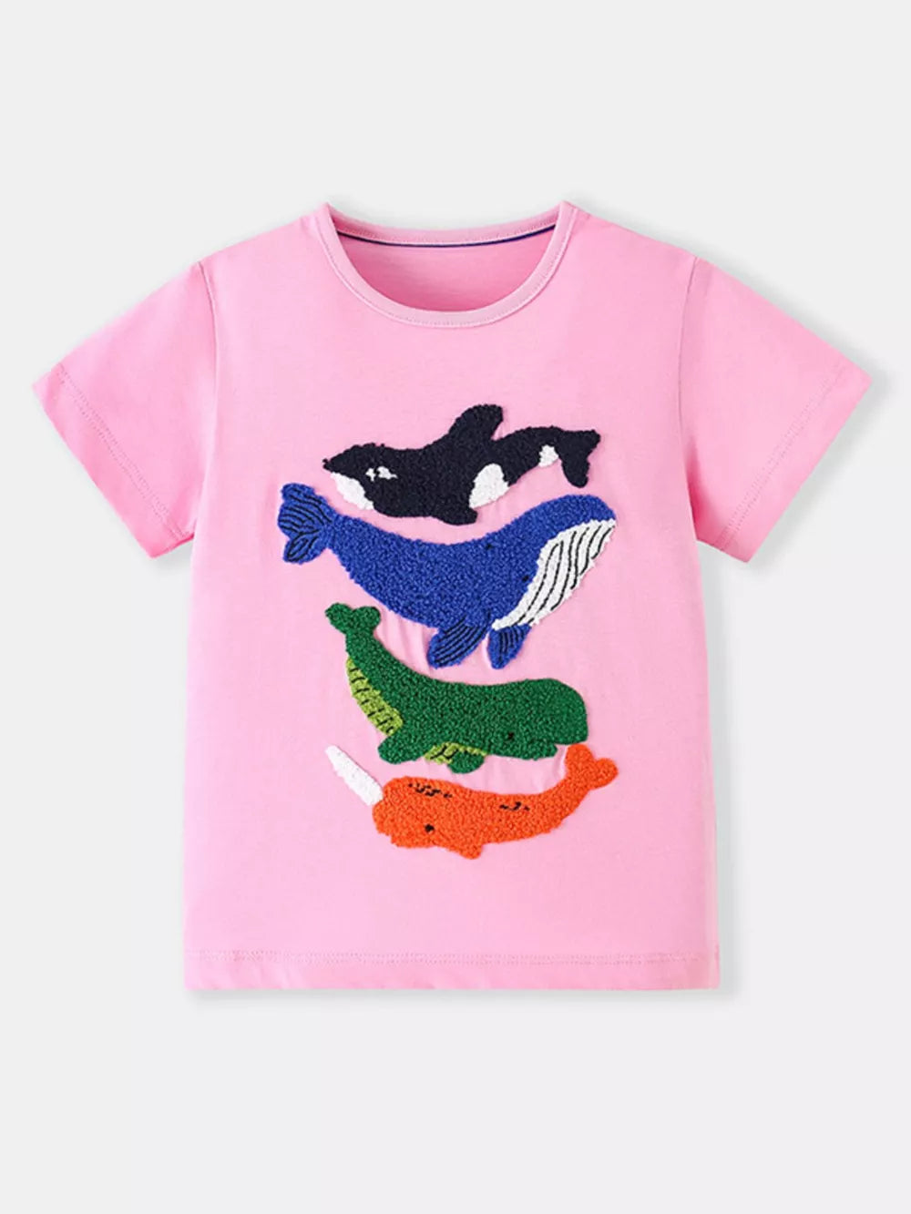 Pink cotton t-shirt with embroidered ocean creatures including a whale, orca, narwhal, and alligator.