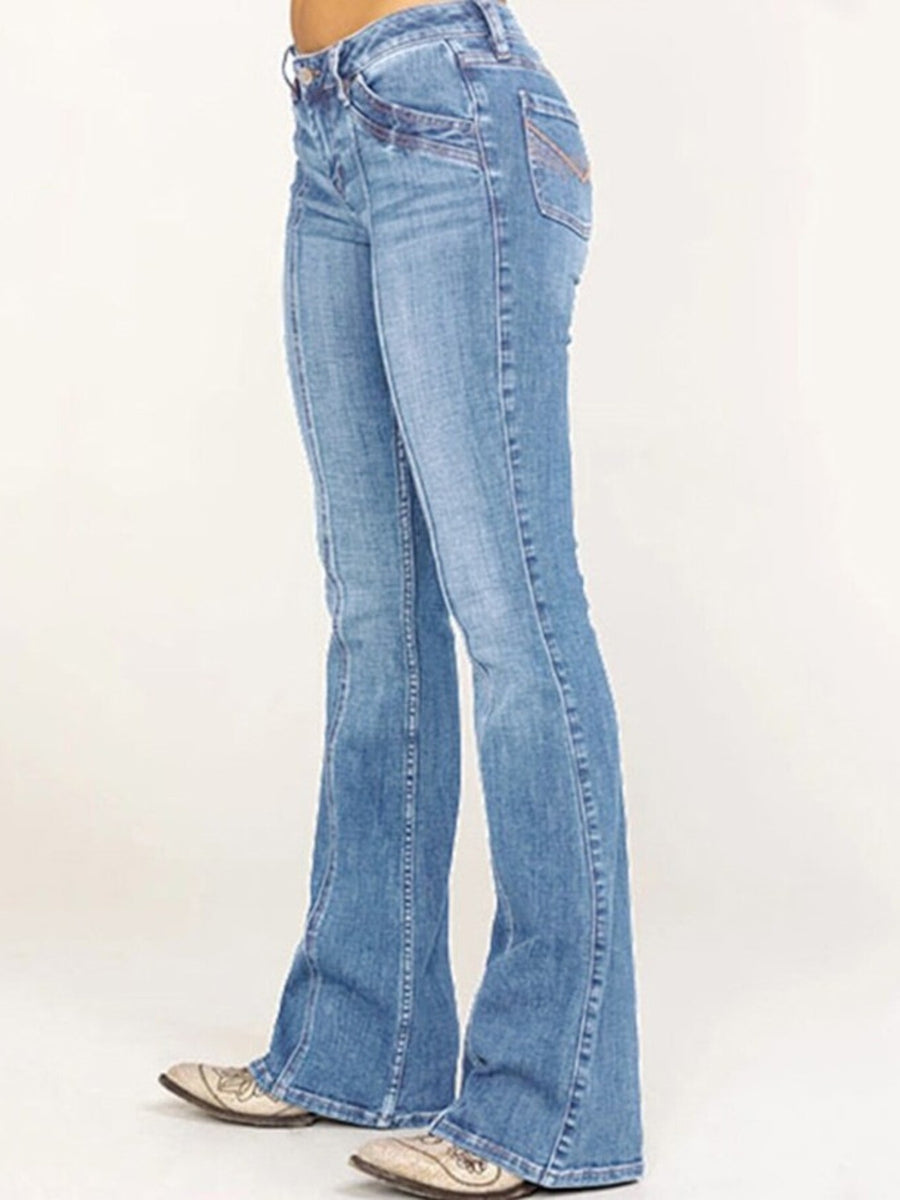 bootcut jeans in medium blue featuring pocketed and bootcut fit